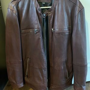 Only wore twice. The color is Wine